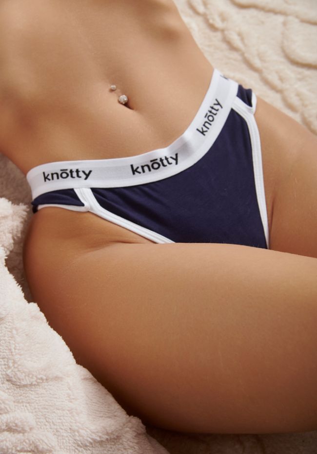 Panties string with white outer tire
