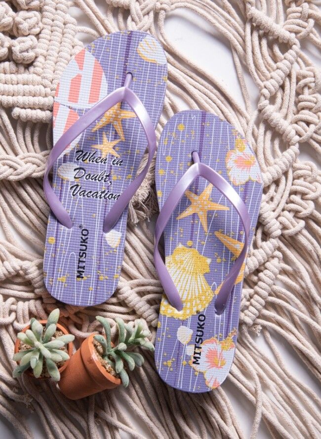 Women's flip flops with shells and stars