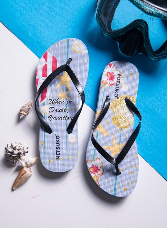 Women's flip flops with shells and stars