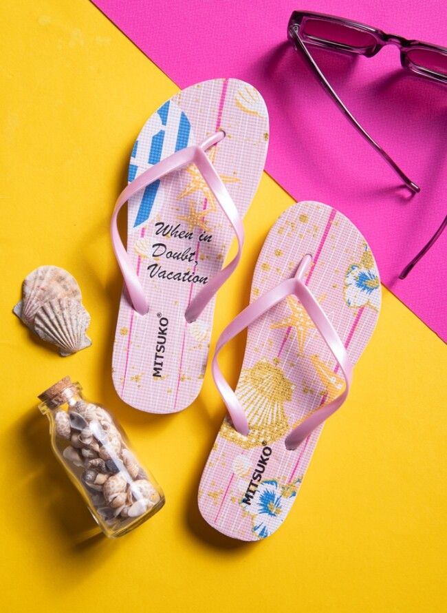 Women's flip flops with shells and stars