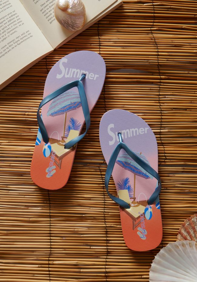 Women's flip flops with umbrella and sunbed