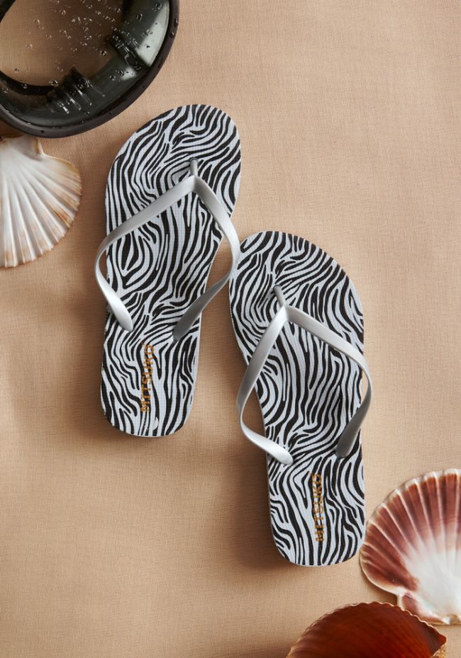 Women's zebra print flip flops